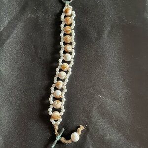 Elegant Beaded Bracelet with Brown and White Accents